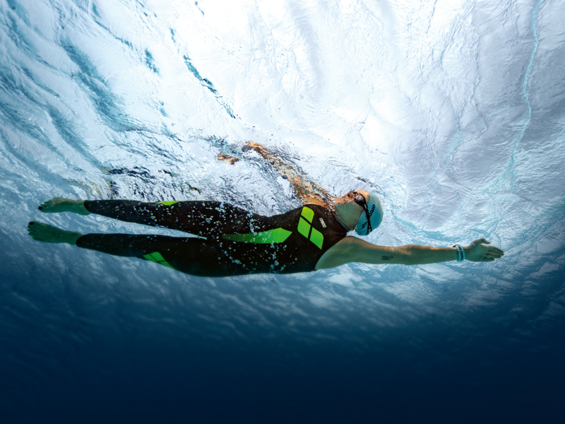 an indoor swimming suit similar that looks like this but isn't thick/made  for open water? I prefer to keep most of my body covered, wetsuits seem to  be thicker than jammer/speedo material.