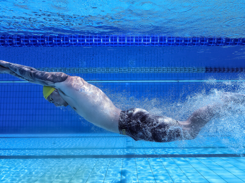 Breaststroke pull: sideview shot of a swimmer doing the breaststroke