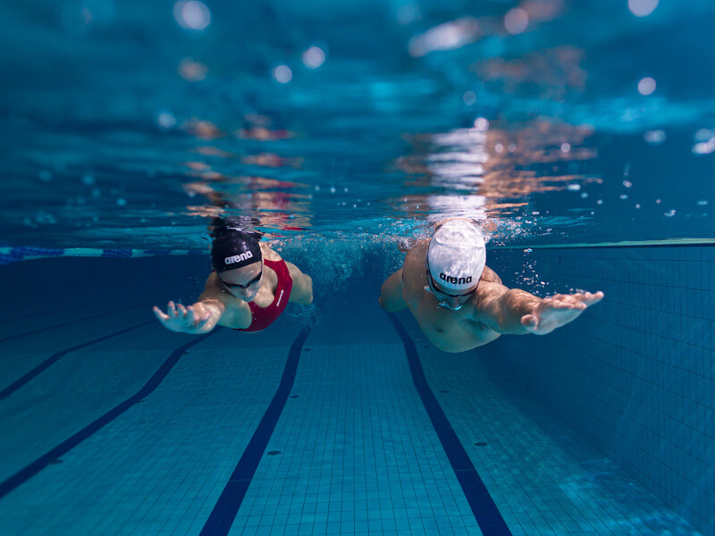 Arm exercises for swimmers: swimmers swimming side by side