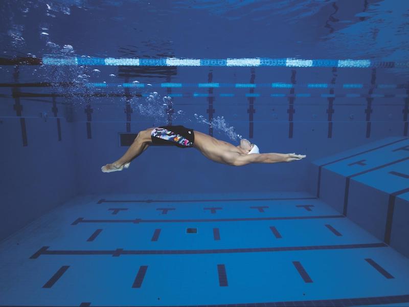 Flip turn drills: sideview shot of a swimmer underwater