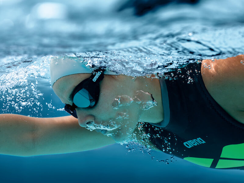 Open water swimming gear: swimmer breathing underwater